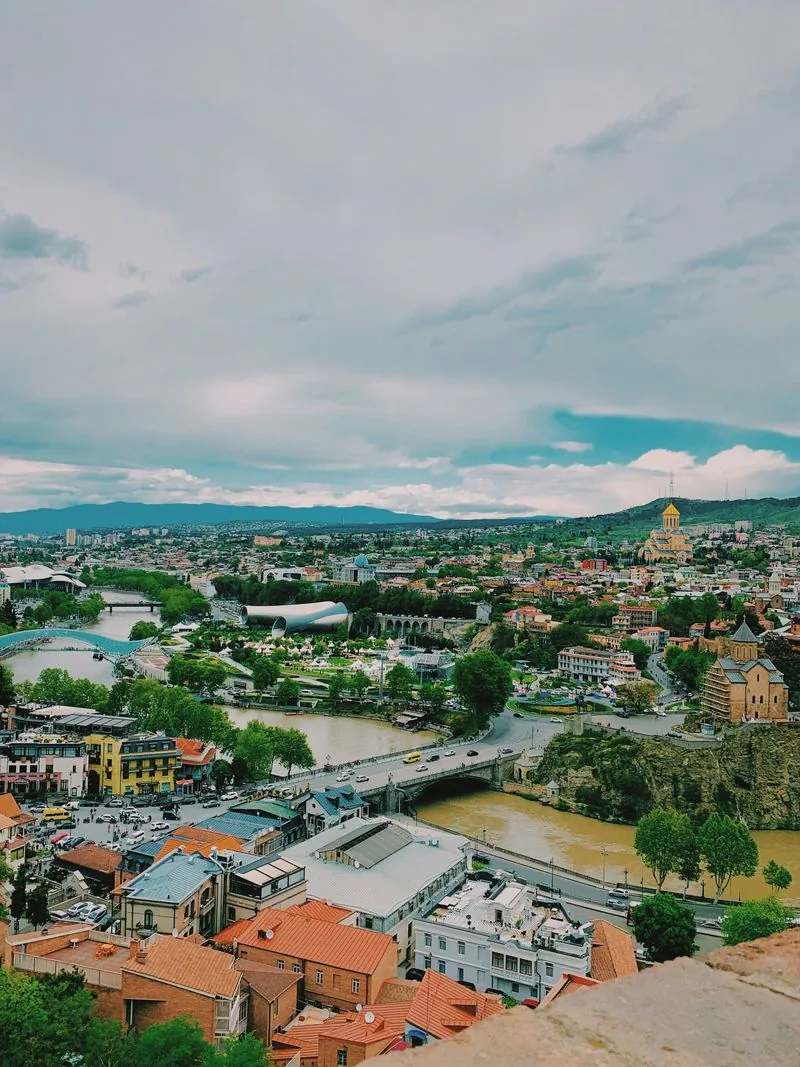 Aerial view of Tbilisi's old town, river and hillside