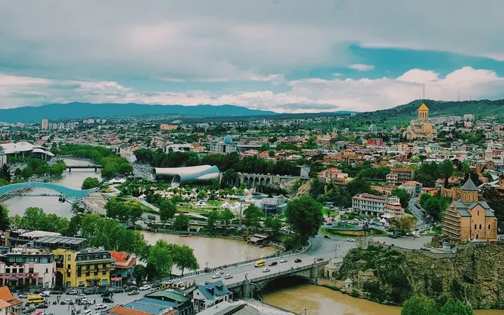 Aerial view of Tbilisi's old town, river and hillside